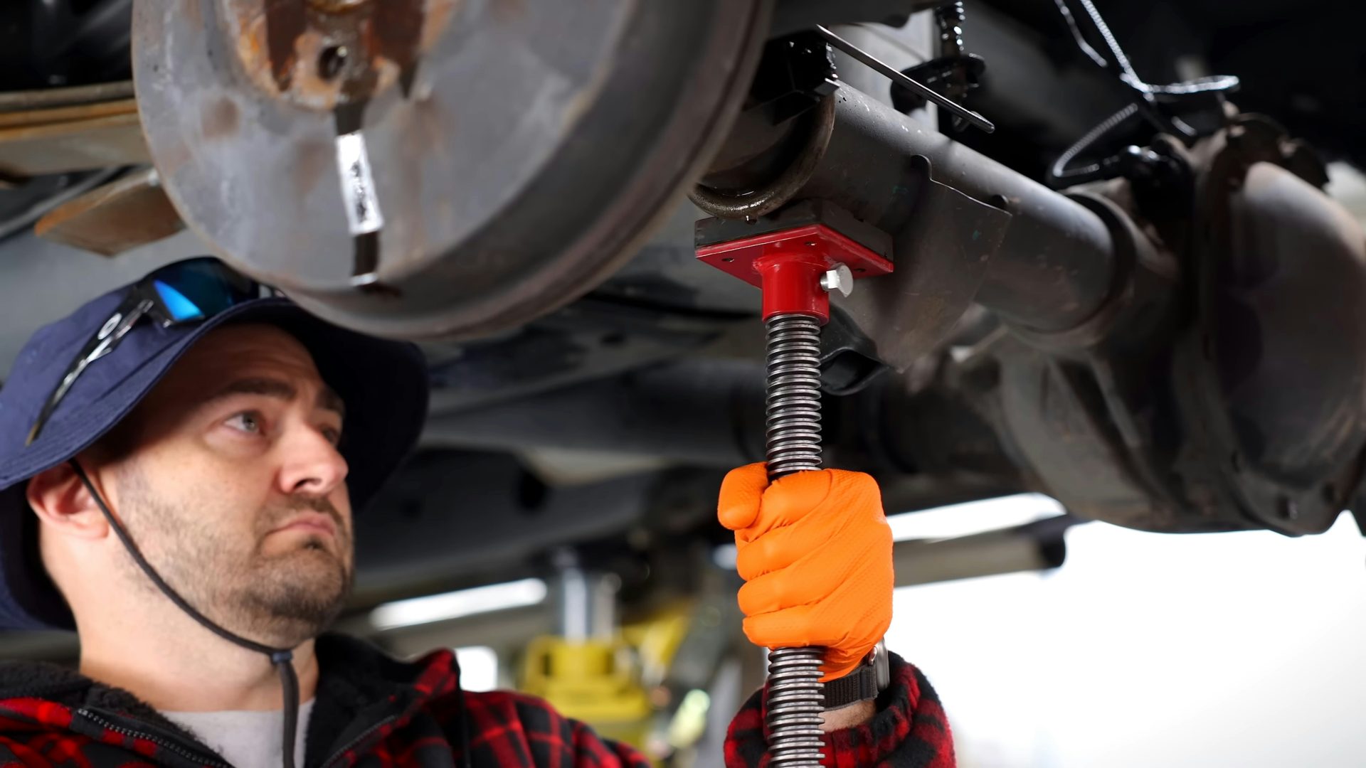 A man working on a car in a garage